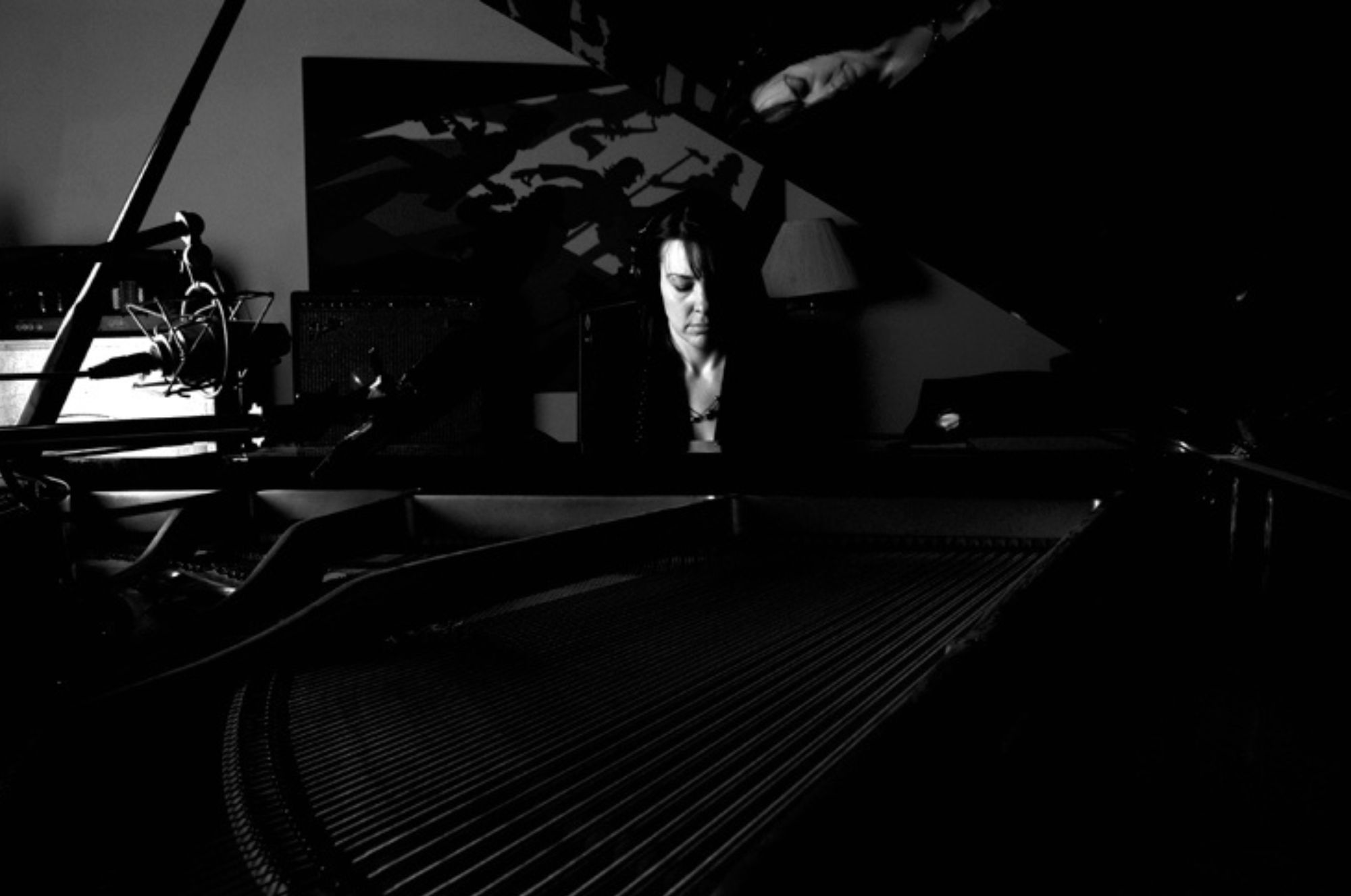 Kimberley Dunn recording wedding songs in studio
