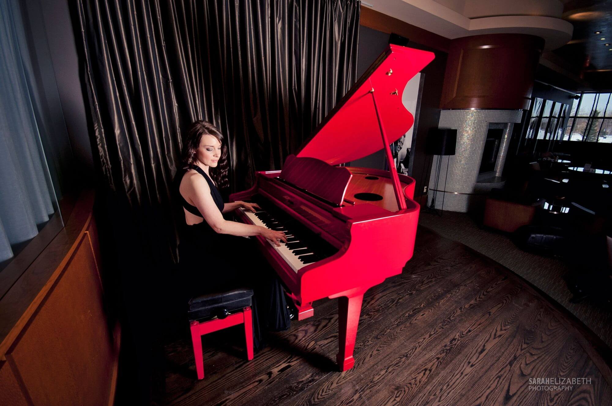 Kimberley Dunn performing at Brookstreet Options Lounge Red Piano