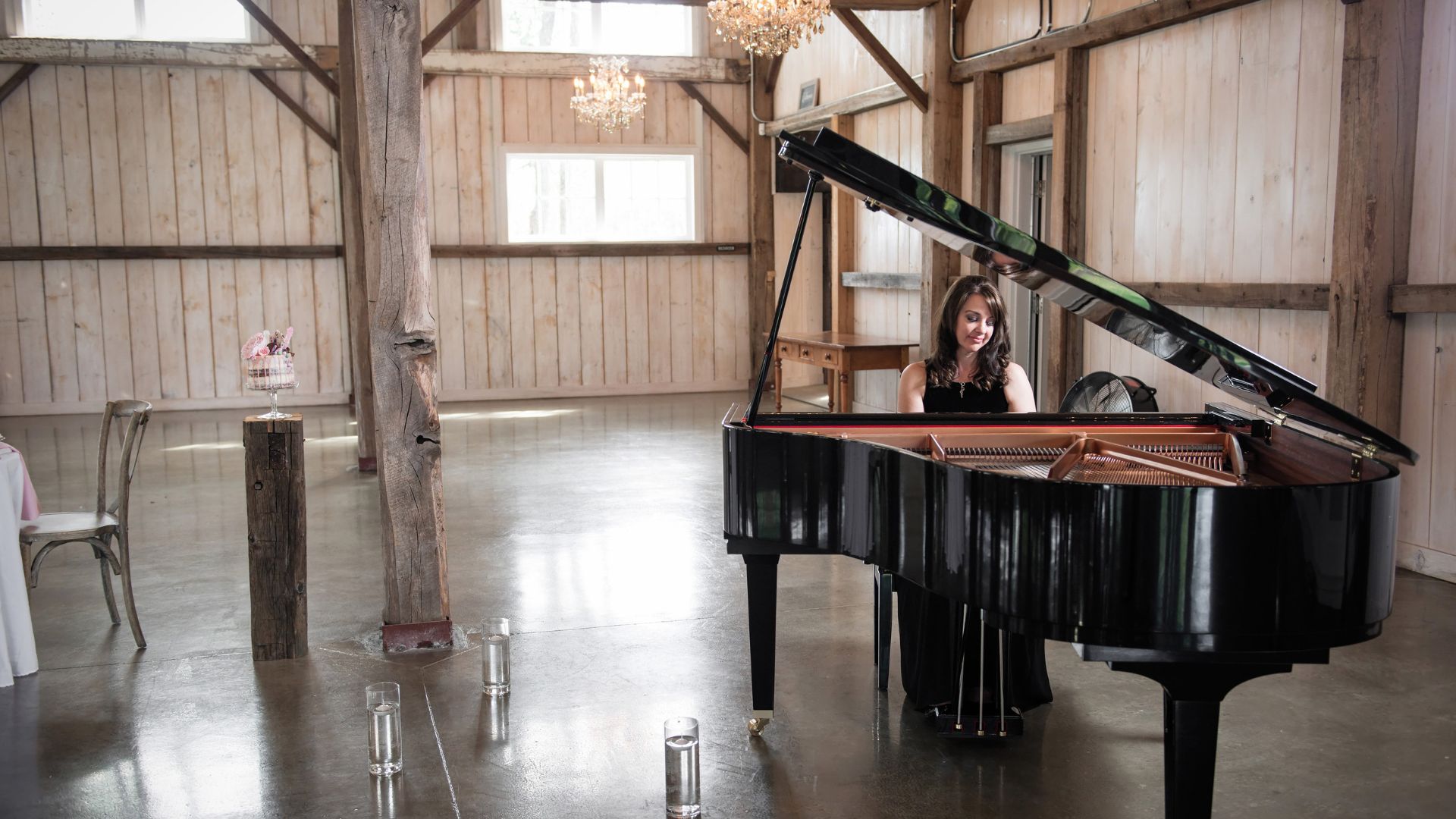 Kimberley Dunn playing grand piano at Stonefields Estate