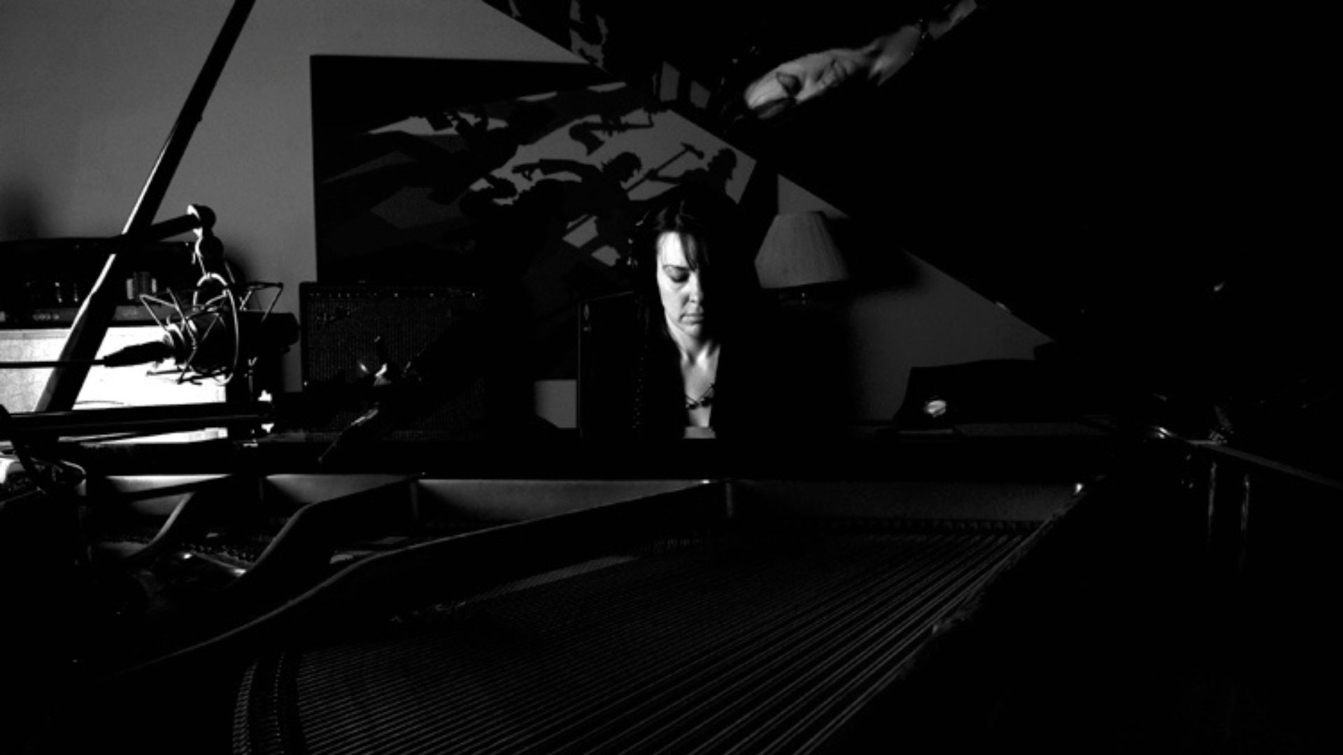 Kimberley Dunn recording wedding songs in studio