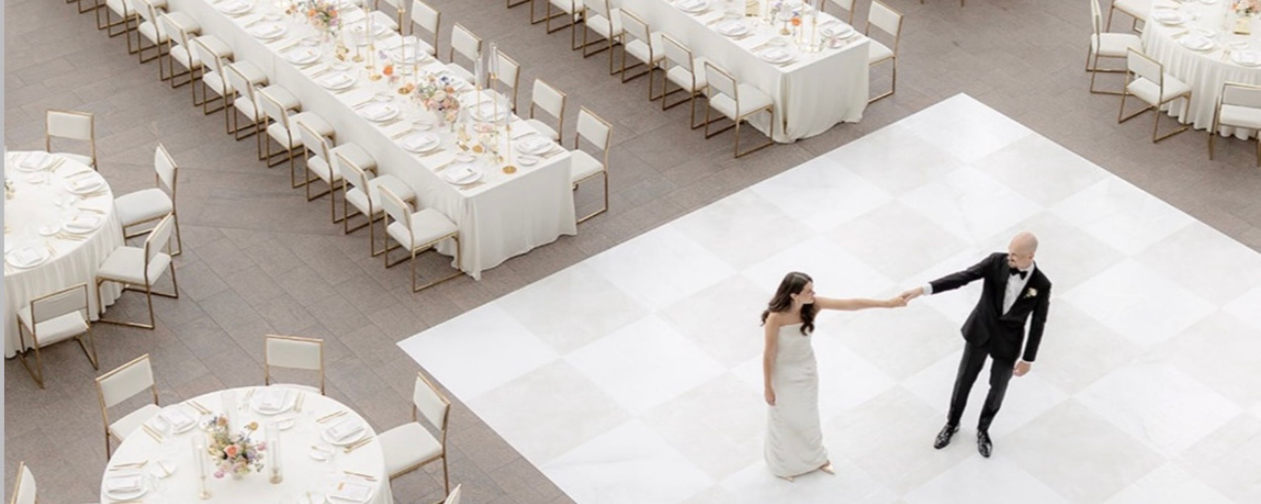 A wedding couple's dancing at the National Gallery of Canada with live music by Kimberley Dunn