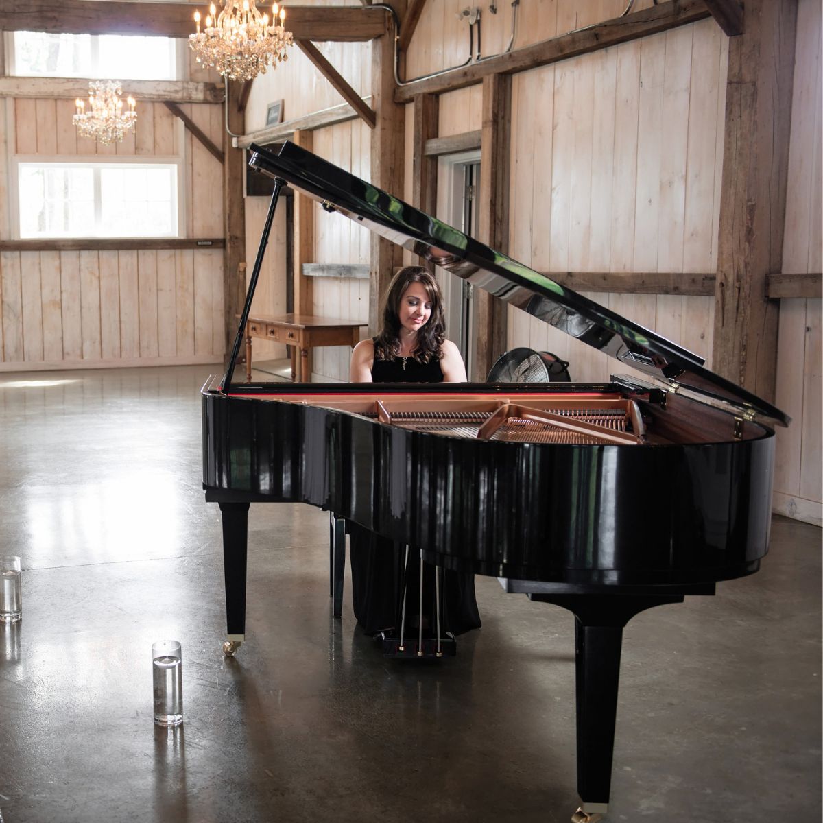 An editorial style photo of Kimberley Dunn, leading to wedding and event song lists.