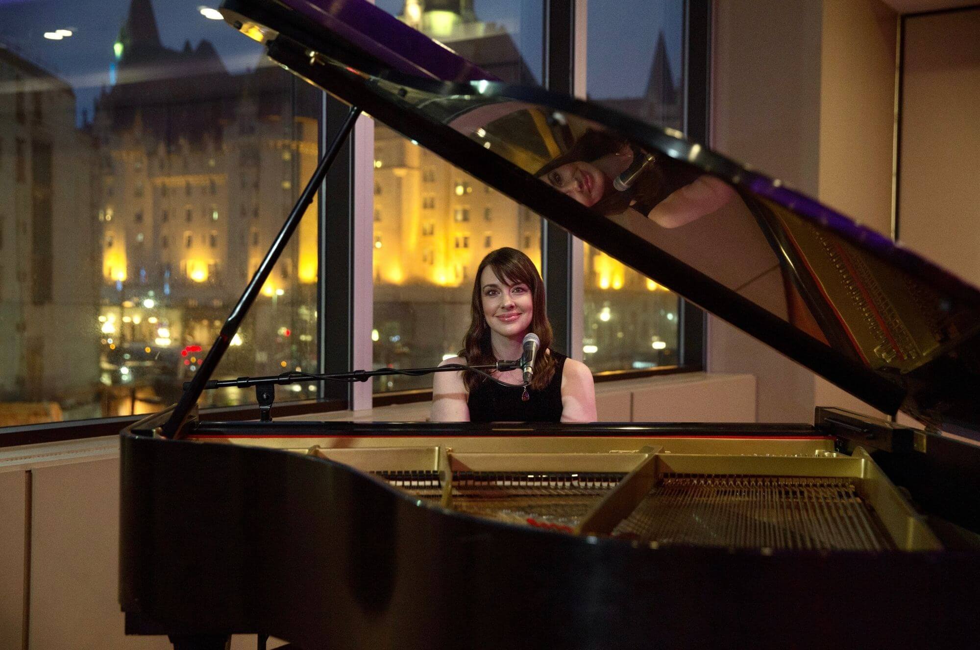 Kimberley Dunn performing at the grand piano at Westin Ottawa in the Governor General Ballroom